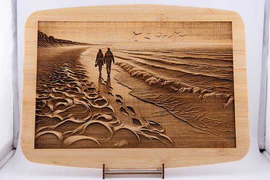 Couple walking on beach cutting board - Bern Laser Works